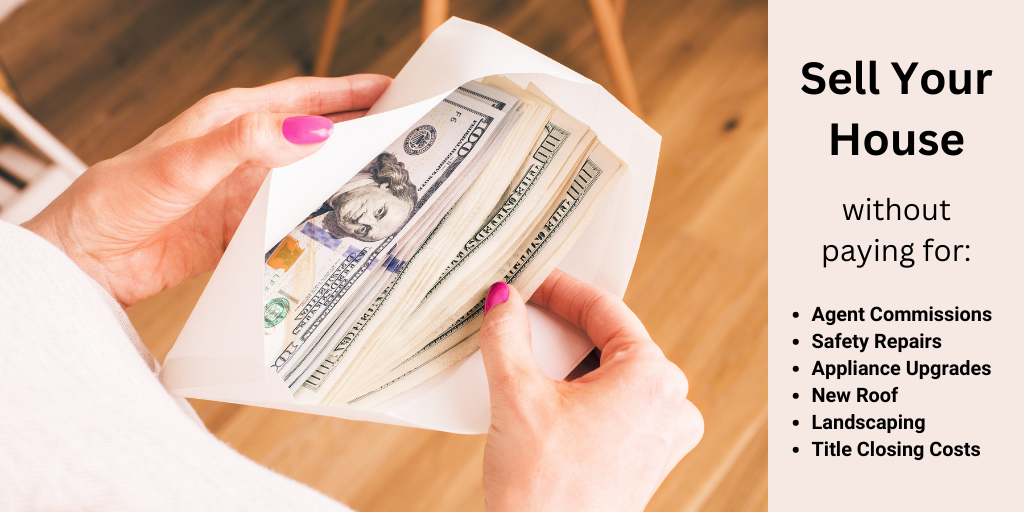 Woman opening an envelope with $100 bills inside.