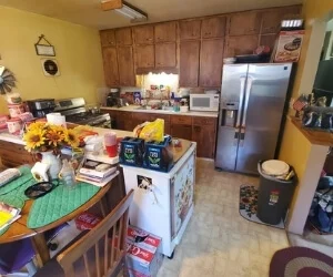 Kitchen of a house purchased by Cash For Houses before it was remodeled.